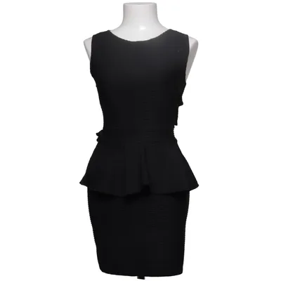 Klänning (CROSS BACK PEPLUM DRESS) från NLY One Elastan, Polyester
