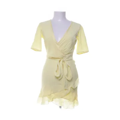 Omlottklänning (Gul) från Nelly Viskos, Polyamid, Polyester