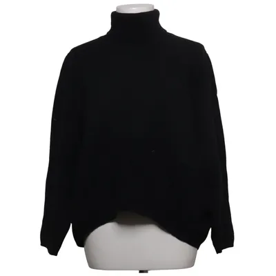 Rollkragenpullover (Schwarz) von Totême Kaschmir, Merinowolle