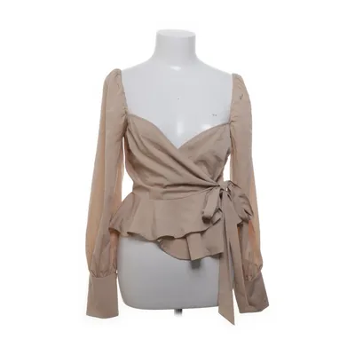 Omlottblus (Wrapped around love blouse) från NLY Trend Polyester