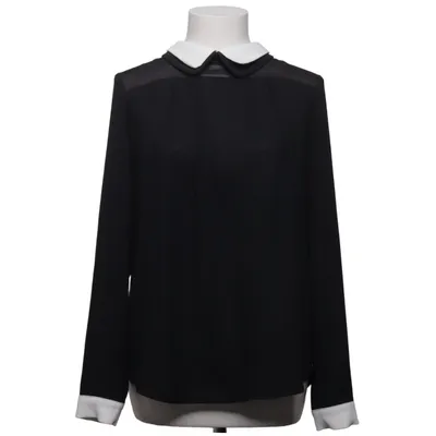 Blus (Svart, Vit) från Aridza Bross Polyester