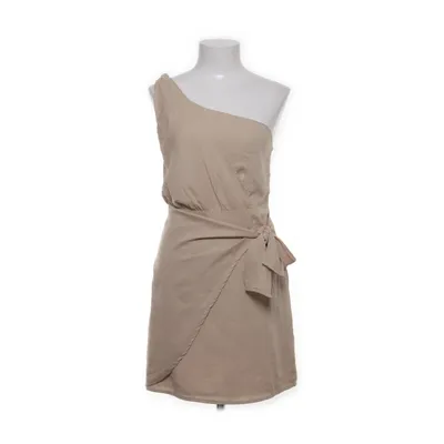 Wikkeljurk (Beige) van Luc.ce Polyester