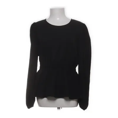 Peplumtopp (ONLMETTE DAR L/S O-NECK TOP NOOS WVN) från ONLY Blue Denim