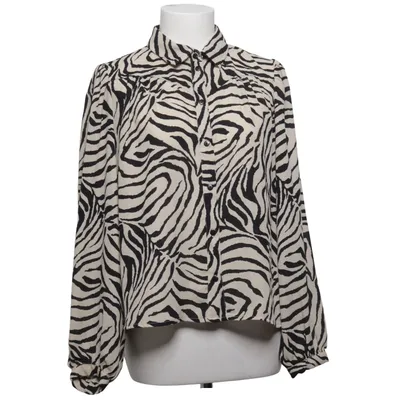 Blus (Beige, Svart) från Pigalle Polyester