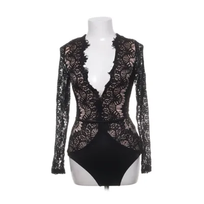 Body (Svart) från Rare London Polyester