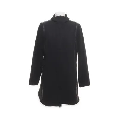 Kappa (Svart) från Junge Danmark Akryl, Polyester, Polyuretan, Skinnimitation, Ull