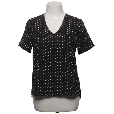 Topp (Svart, Vit) från Soaked in Luxury Polyester