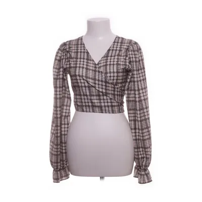 Wikkeltop (Bruin, Wit, Zwart) van New Girl Order Elastaan, Polyester