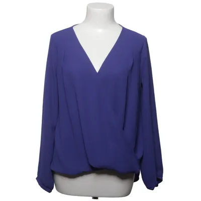Blouse portefeuille (Bleu) de Lush