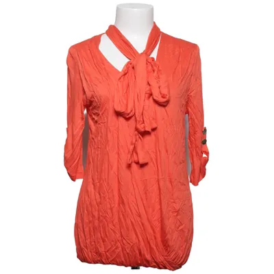 Haut (Orange) de Caroline Biss