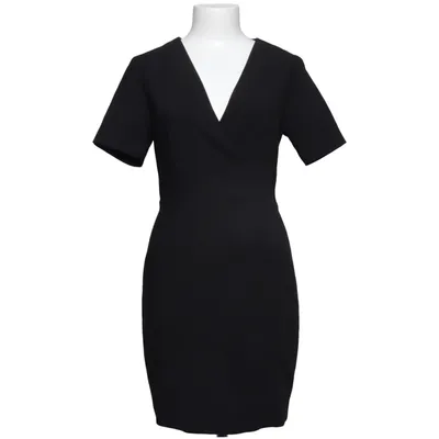 Wikkeljurk (Zwart) van Modström Elastaan, Polyester, Viscose
