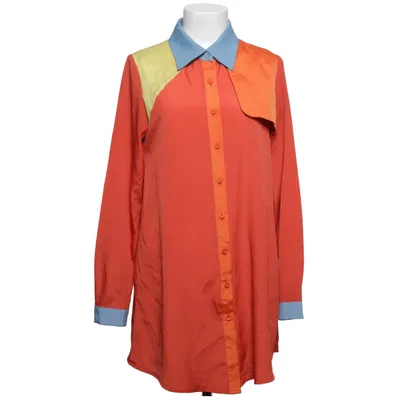 Blus (Röd, Blå, Gul, Orange) från Kling