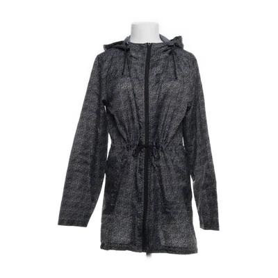 Regnkappa (Svart, Vit) från Future Polyester