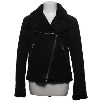 Veste en peau de mouton retournée (Noir) de Acne Coton, Cupro
