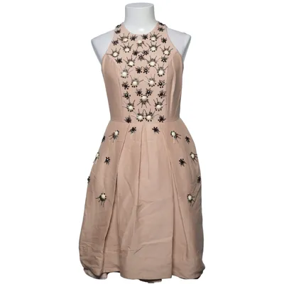 Klänning (Beige) från H&M Conscious Collection Ekologisk bomull, Återvunnen polyester, Silke