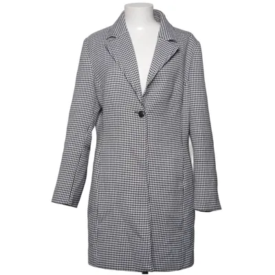 Kappa (Svart, Vit) från Manguun Elastan, Polyester, Viskos