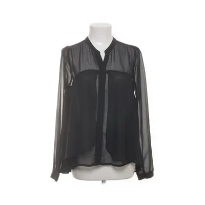 Blus (63-0731) från Instinct Polyester