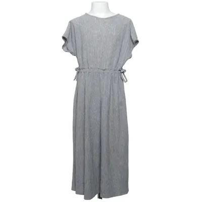 Jumpsuit (Zara Kids • byxdress • jumpsuit • barn 122 • grå • ribbad • kortärmad • vida ben • knytmidja • mjuk vardag • sommarplagg • lekvänlig • minimalistisk • Scandi style • quiet luxury kids • capsule wardrobe • second hand) van Zara Kids