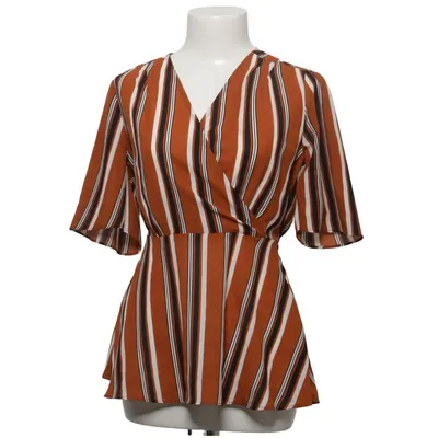 Top péplum (Marron, Noir, Blanc) de Wardrobe Polyester