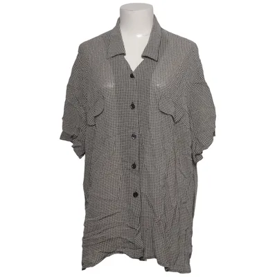 Chemise à manches courtes (Noir, Beige) de Hucke