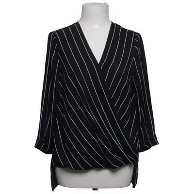 Wikkelblouse (Zwart, Wit) van Atmosphere Polyester