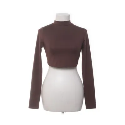 Crop top (Bruin) van NLY Trend