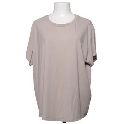 T-shirt (Beige) från H&M Move Elastan, Polyester, Viskos