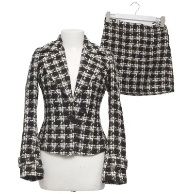 Mantelpak (Zwart, Wit, Beige) van Isabell Kristensen Acryl, Polyester, Wol