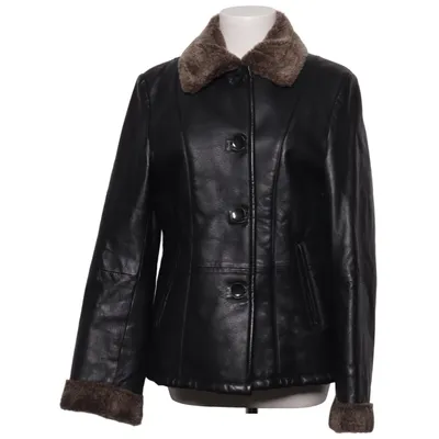 Veste en peau de mouton retournée (Noir) de Joy Polyester, Cuir
