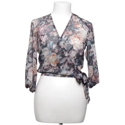 Wikkelblouse (Meerkleurig) van The Girl Who Polyester