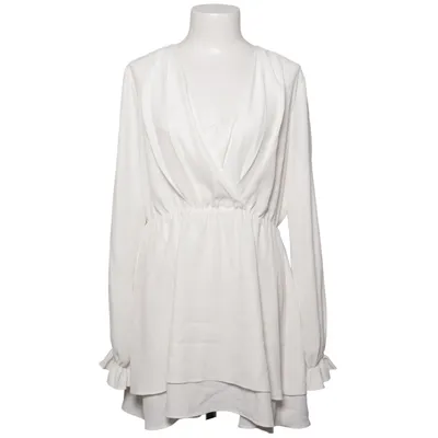 Omlottklänning (V-Neck Tied Front Flowy Dress) från Donna Romina x NA-KD Polyester