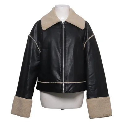 Shearling Jacke (Schwarz, Beige) von Edited Polyurethan, Recyceltes Polyester