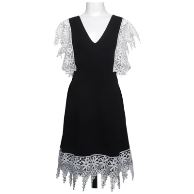 Hängselklänning (Svart, Vit) från Christina Rohde