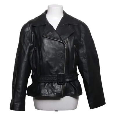 Bikerjacka ( gränsar mot en 44.  Retro, 90-tal, lite bredare axlar och markerad midja) från Oui Set