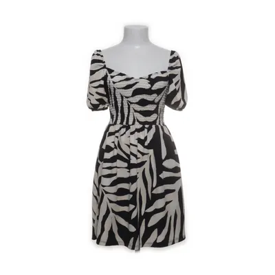 Klänning (Svart, Vit) från H&M Elastan, Polyester