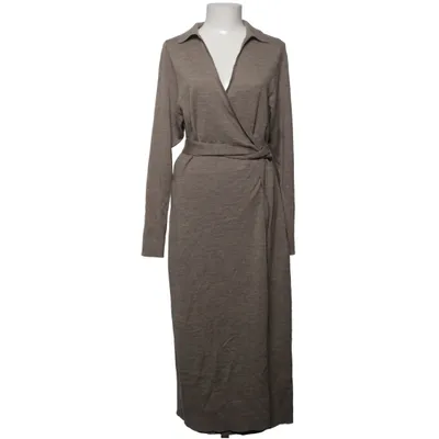 Wrap cardigan (Beige) from STOCKH LM Merino wool