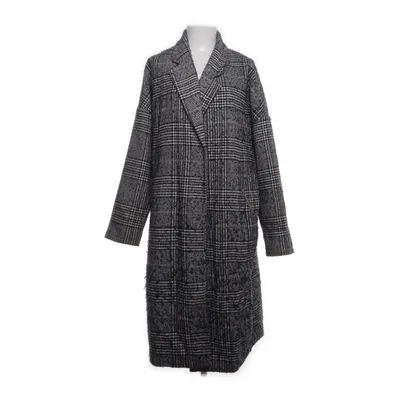 Coat (White, Black, Blue) from Mango Suit