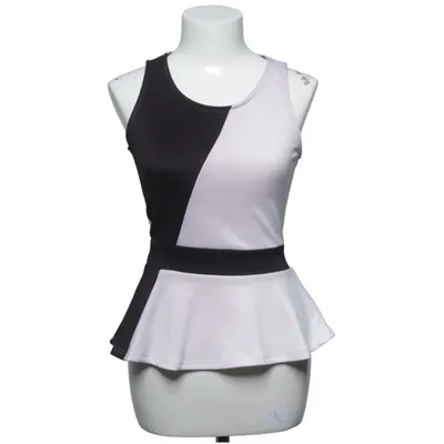 Top péplum (Noir, Blanc) de Suzy Shier Élasthane, Polyester