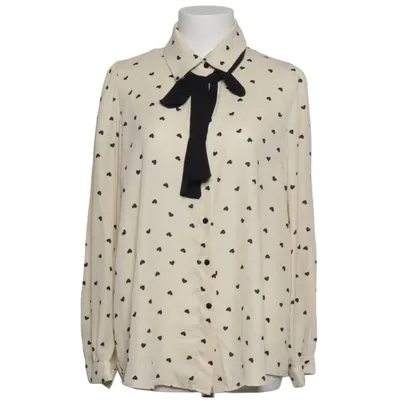 Blus (Beige, Svart) från Gusto Polyester