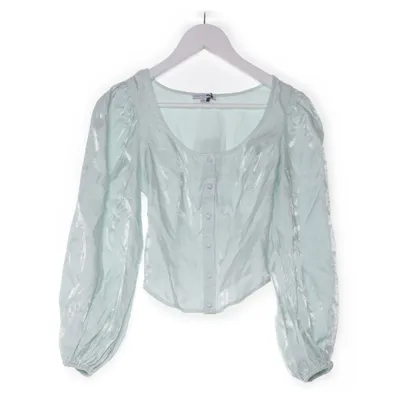 Blus (Turkos) från Fashion Nova