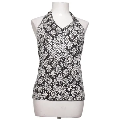 Halter neck top (Black, White) from New Line Mac Scott
