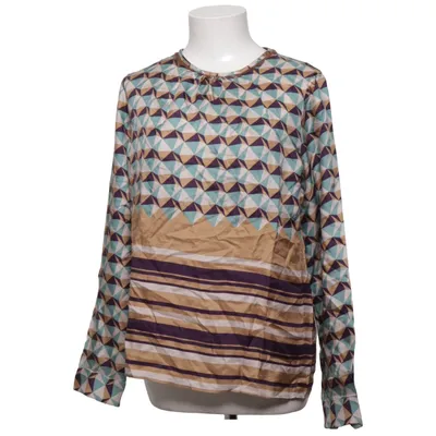 Blus (Blå, Lila, Beige, Vit) från Caliban