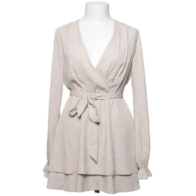 Robe portefeuille (V-Neck Tied Front Flowy Dress) de Donna Romina x NA-KD Polyester