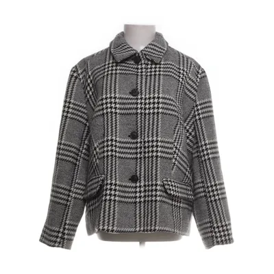 Kappa (Svart, Vit) från H&M Polyester, Ull