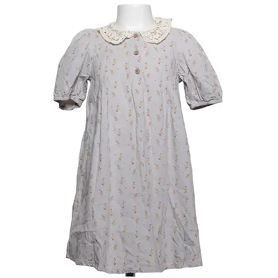 Klänning (NMFDAISY SS LOOSE DRESS) från Lil'Atelier Ekologisk bomull