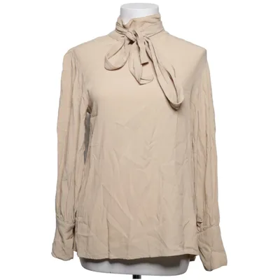 Knytblus (Beige) från Milook Viskos