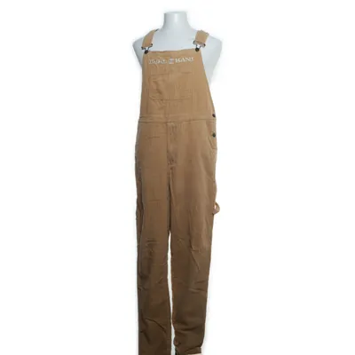 Hängselbyxor (Beige) från Karl Kani Bomull