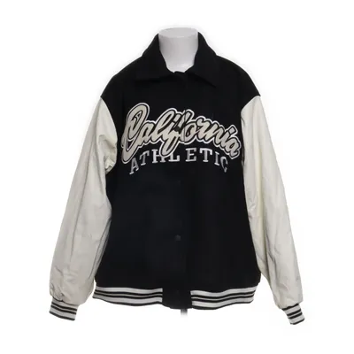 Jacka (Svart, Vit) från Divided by H&M Polyester, Polyuretan