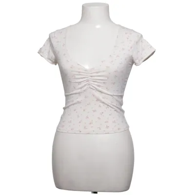 Haut (Blanc, Rose) de Brandy Melville