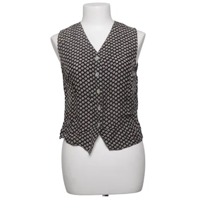 Gilet (Noir, Blanc) de Birgitta